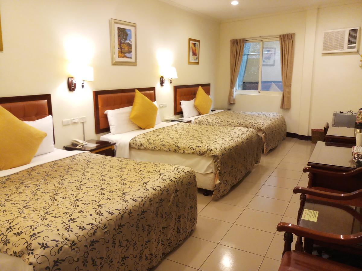 พูติ คอมเมอร์เชี่ยล โฮเต็ล Hotel หลงตัน ภายนอก รูปภาพ