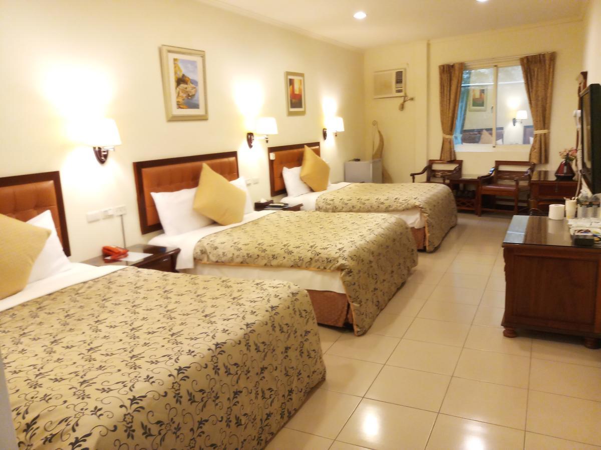 พูติ คอมเมอร์เชี่ยล โฮเต็ล Hotel หลงตัน ภายนอก รูปภาพ